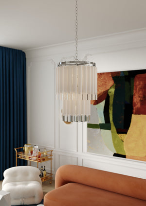 Tyrell Chandelier 23.75" x 35.75" in polished nickel styled in a formal living room for warm, layered light at Laurie Yapp Home.