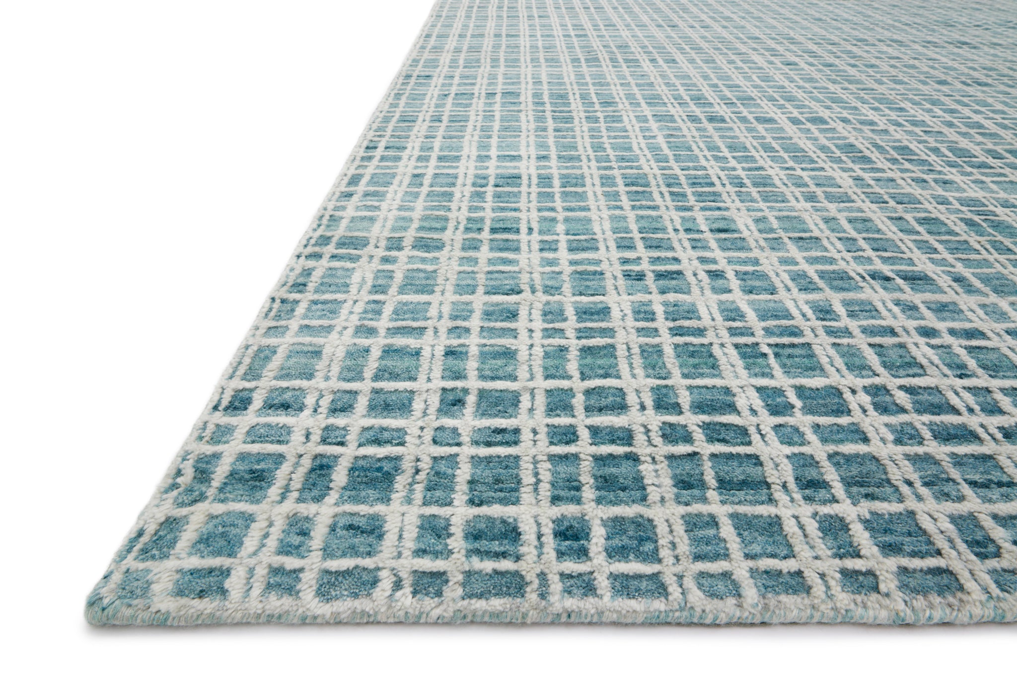Side view of the Urbana Aqua rug.