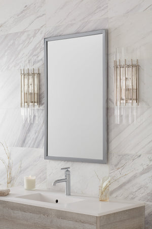 Wallis Wall Sconce in polished nickel shown from the front to reveal the arm curve and shade silhouette.