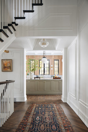 Washington Lantern 20" in aged brass styled in an entry hallway for warm, layered light at Laurie Yapp Home.