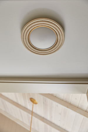 Zion Flush Mount 10" styled in a bedroom for warm, layered light at Laurie Yapp Home.