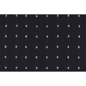 Close-up of Brittany Indoor Pillow fabric, featuring black background with white squares.