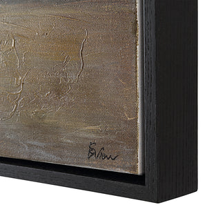 Mackay canvas art featuring textured brown and gold tones, framed in a sleek black wooden frame.