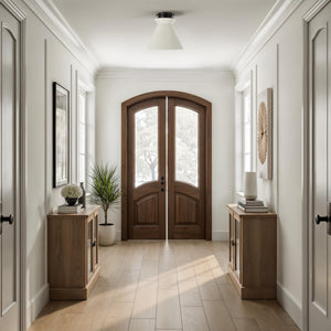 Sebastian Flush Mount light installed in a hallway, illuminating a wooden door and decor.