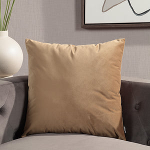 Alchemilla Indoor Pillow in brown velvet, styled on a gray sofa with modern decor.