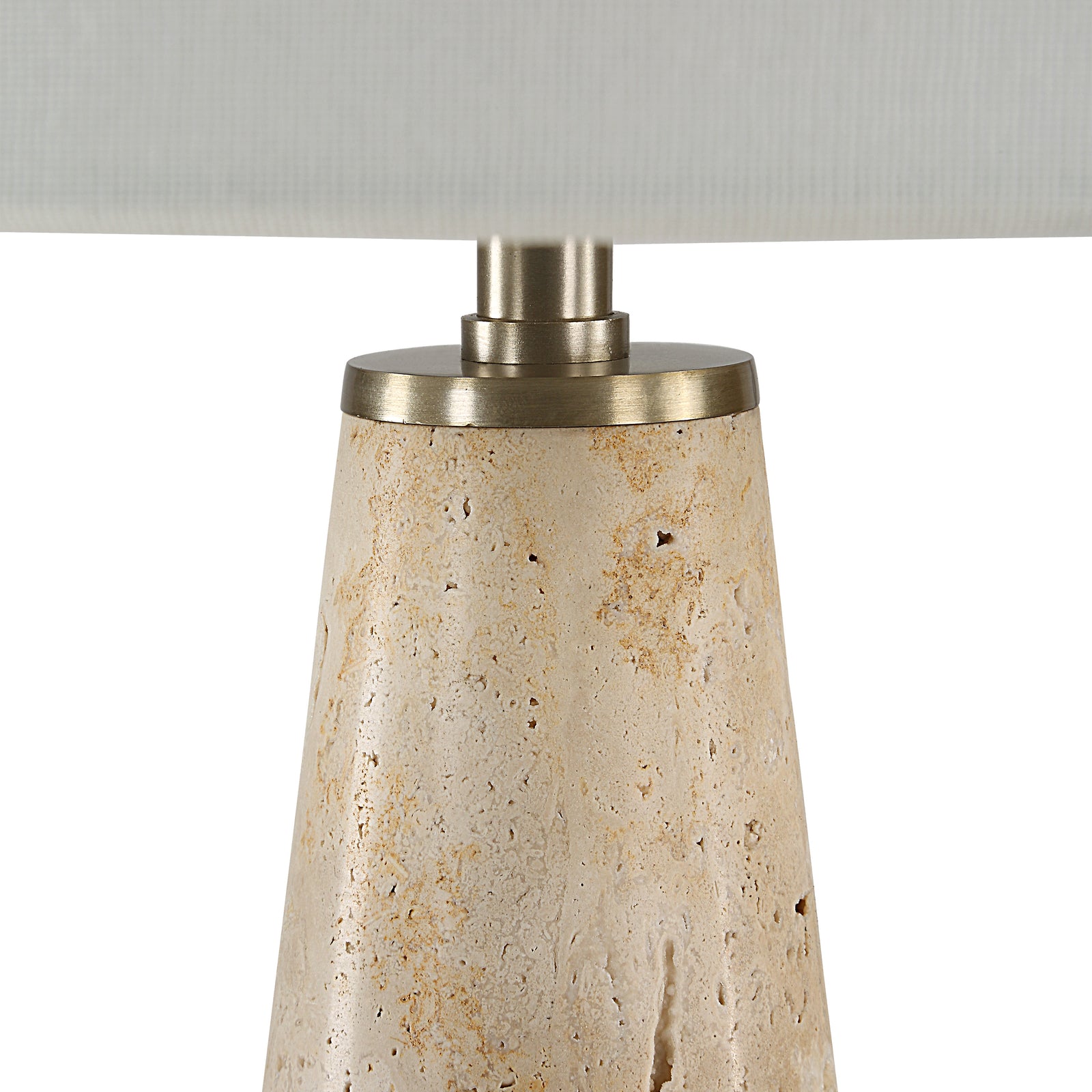 Almeria table lamp with a beige stone base and white fabric shade, showcasing a modern design.