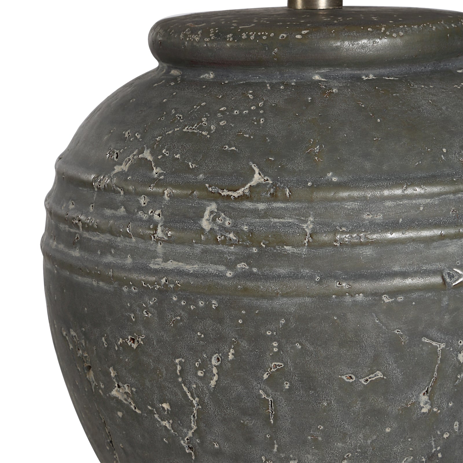Lino Table Lamp with a gray ceramic base and white fabric shade, side view.