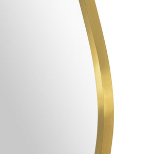 Close-up of Nucleus Wall Mirror's gold frame showcasing its smooth, curved edge.