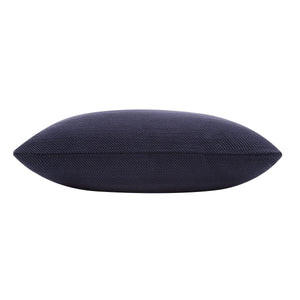 Side view of Forester decorative pillow in dark navy with a sleek design.