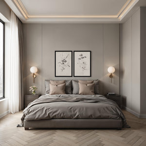 Adeline artwork displayed in a modern bedroom, featuring two floral prints above a gray bed.