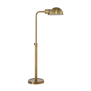 Halle table lamp with a sleek brass finish, featuring a dome-shaped shade and a round base, showcasing a modern design.