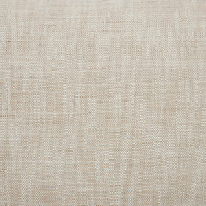 Close-up of Amal indoor pillow showcasing its light beige textured fabric.