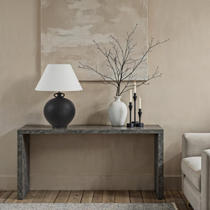 Alicia Table Lamp by Renwil, black ceramic base with white shade on a console table.