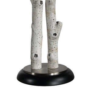 Leandro Table Lamp close-up showing white branch design and black base.