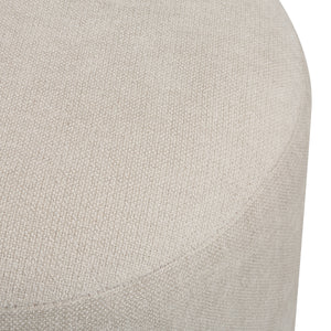 Top view of Persea stool highlighting the soft beige fabric and rounded shape.