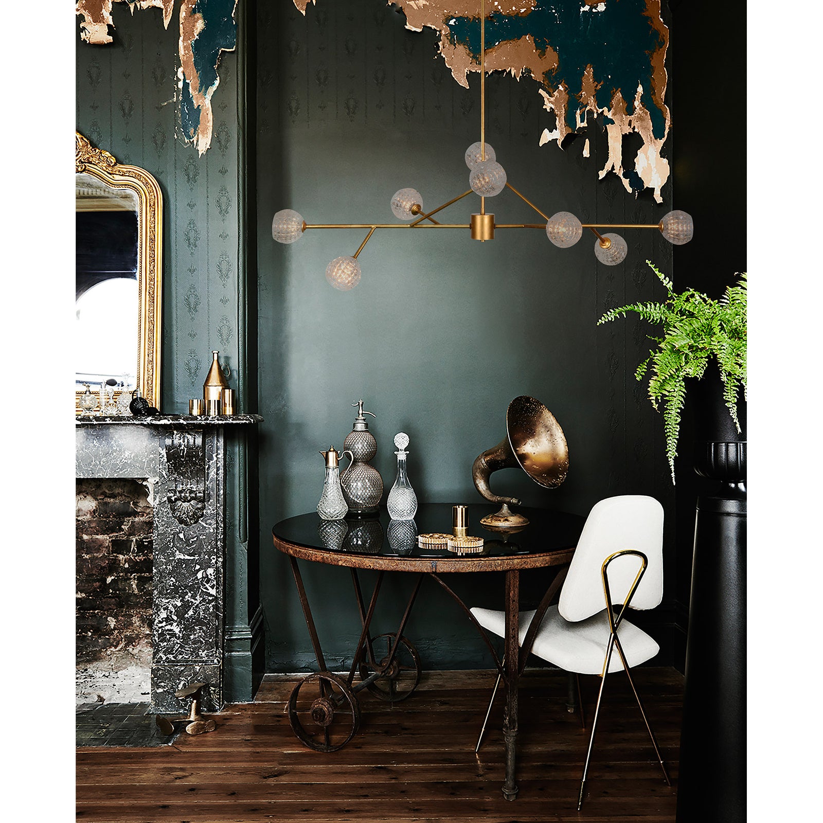 Damas Ceiling Fixture in gold finish with eight clear glass globes, modern design, hanging from a ceiling mount.