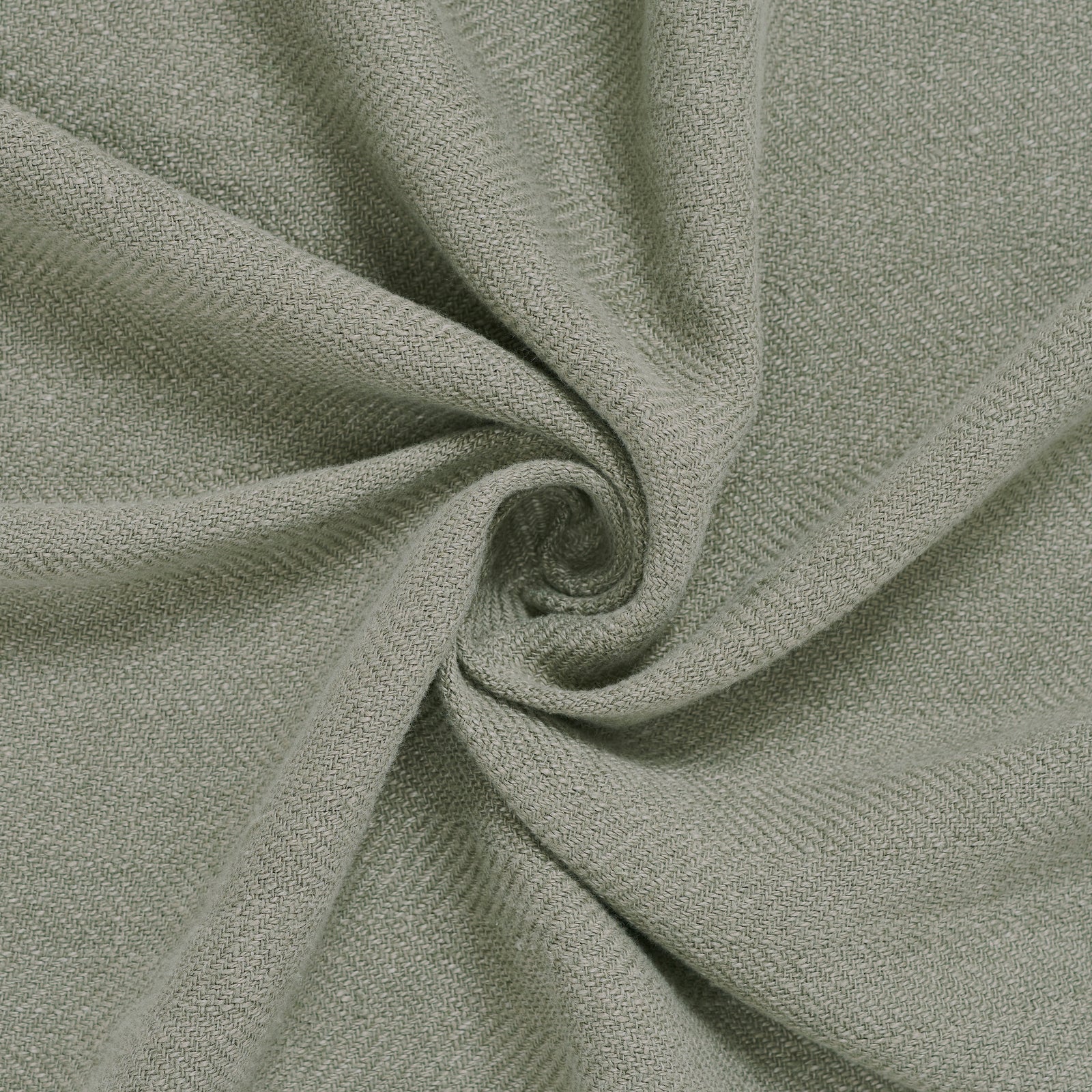 Vernier Throw in olive green, folded with frayed edges, showcasing a textured pattern.