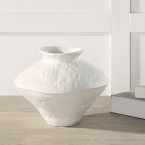 Mills Vase by Renwil, white ceramic vase displayed on a wooden table with books.
