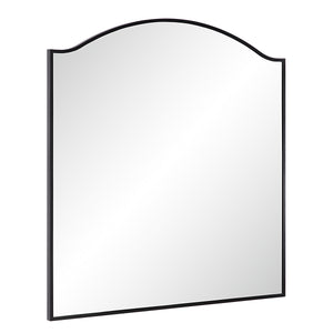 Bandon Wall Mirror angled view, featuring a black frame and a curved top design.