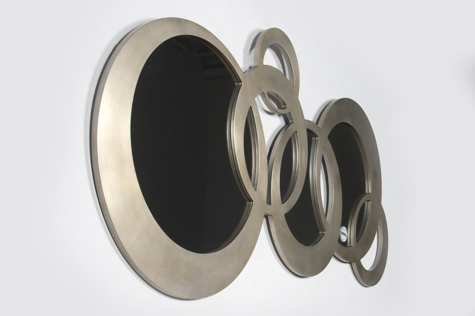 Dublin Circle Wall Mirror featuring multiple overlapping circular mirrors in a silver finish.