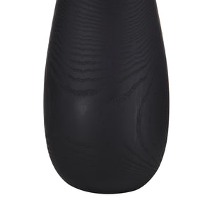 Close-up of Tala Table Lamp's black base showcasing wood grain texture
