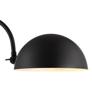 Close-up of Sansia Table Lamp's black dome shade with a warm interior.