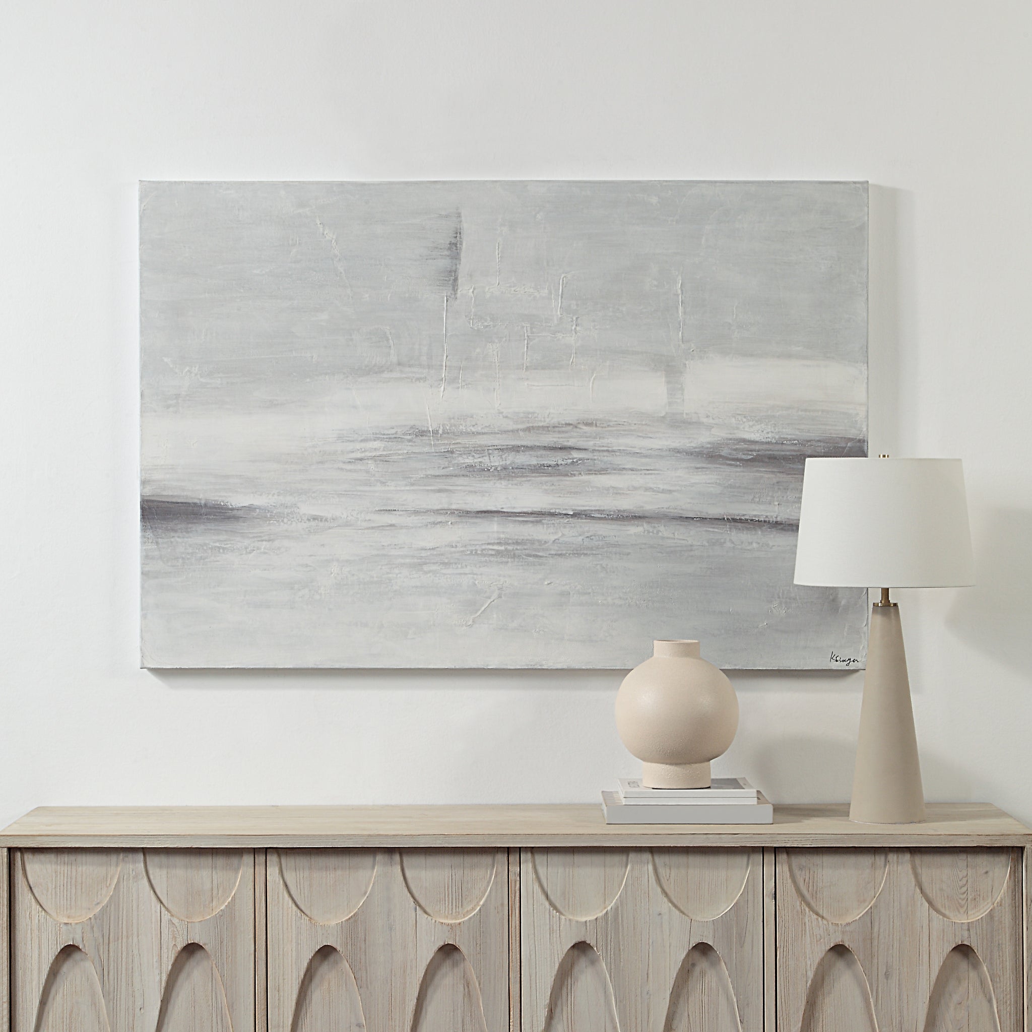 Benalla Canvas Art hanging above a wooden console with a lamp and vase, in a modern setting.