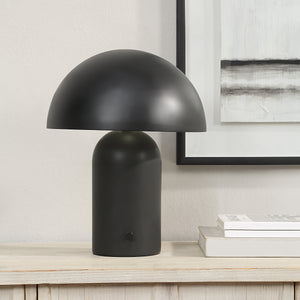 Sombra Table Lamp by Renwil, black lamp on a wooden table next to framed art