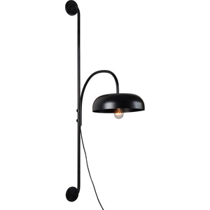 Draco Wall Sconce in black metal with a curved arm and dome shade, featuring an exposed bulb.