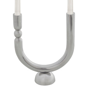 Darnay Candle Holder by Renwil in polished silver, featuring a curved design with a round base.