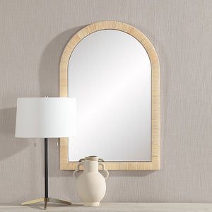 Tally Wall Mirror displayed on a wall next to a lamp and vase, showcasing its design