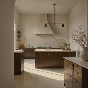 Saskia ceiling light fixture in a stylish kitchen with dark cabinets and a marble backsplash.