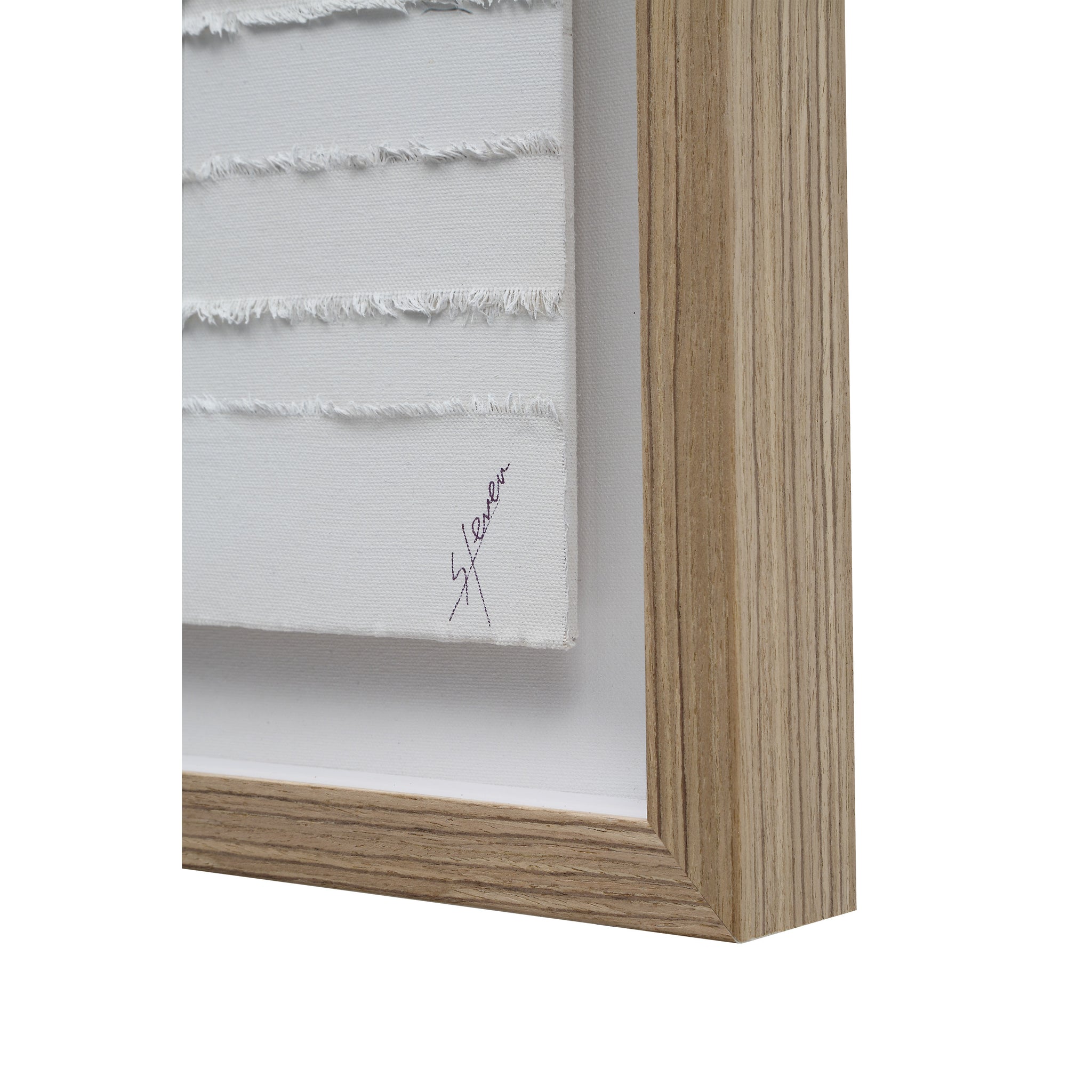 Trax wall art close-up showing white textured canvas with frayed edges, framed in light wood.