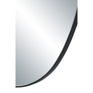 Close-up of Messini mirror edge, showcasing the black frame and reflective surface.