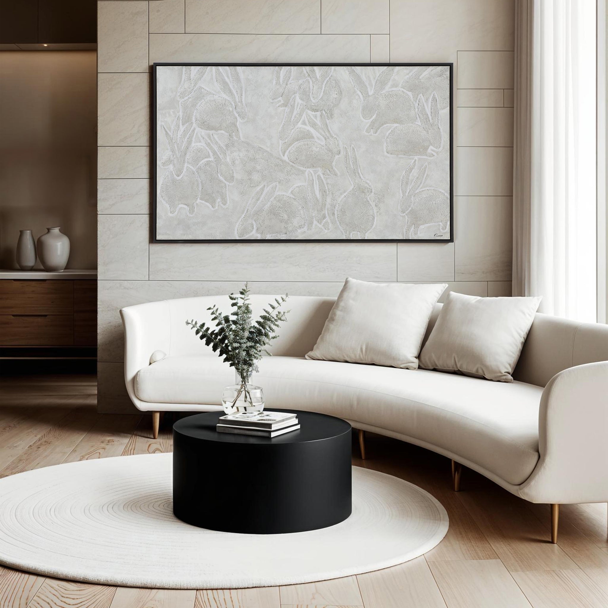 Lacey canvas art displayed in a modern living room above a white curved sofa.
