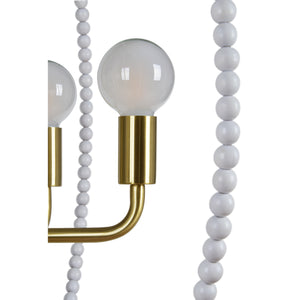 Close-up of Basil Ceiling Fixture showing gold light bulb holder and white bead details.