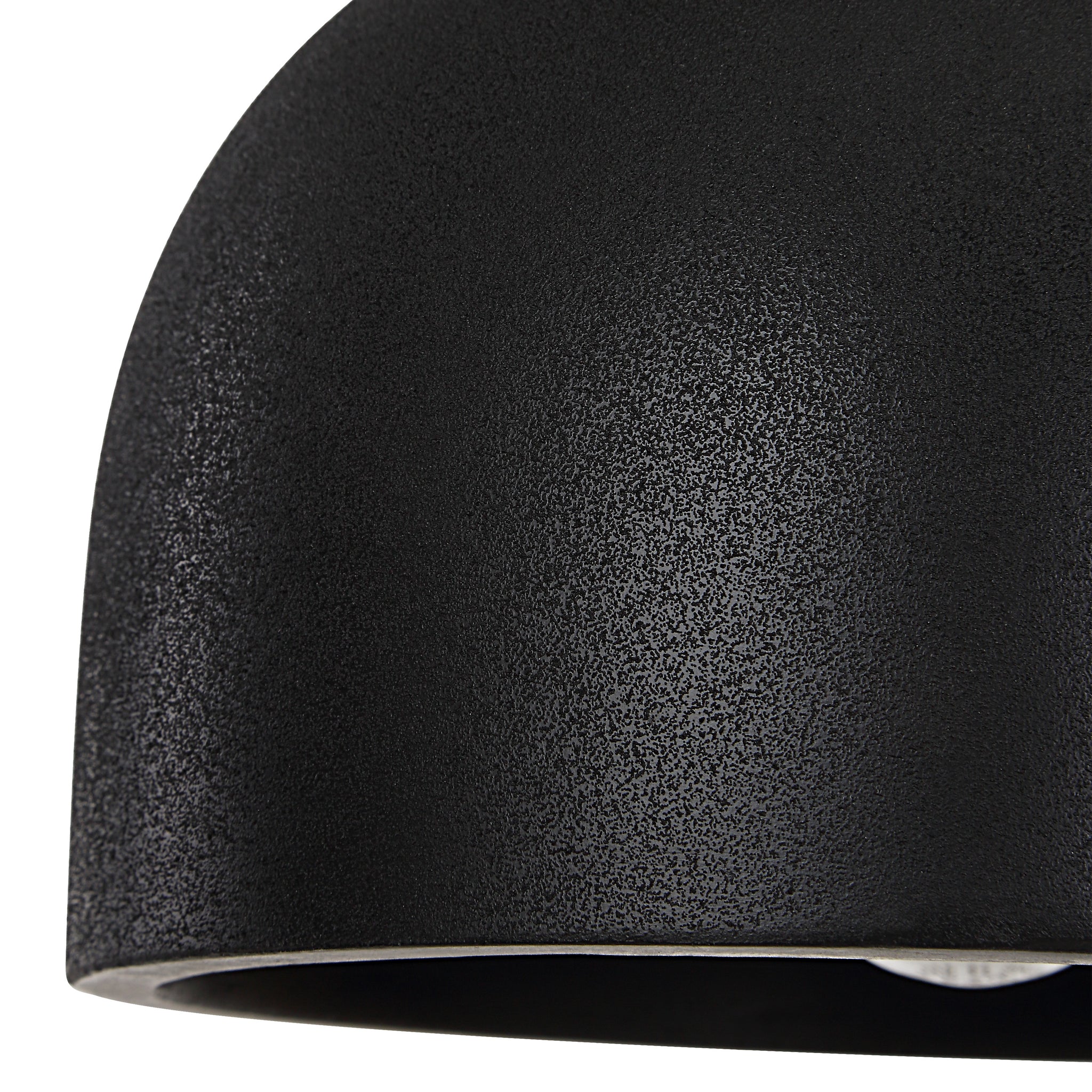 Close-up of the black Caen chandelier highlighting its textured surface.
