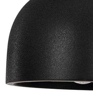 Close-up of the black Caen chandelier highlighting its textured surface.