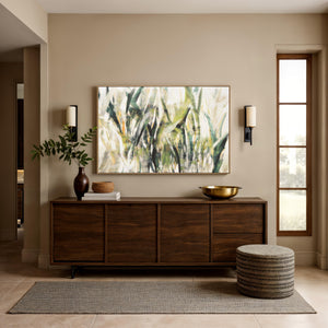 Minthe canvas art featuring abstract green and yellow brush strokes in a wooden frame, displayed in a modern interior.