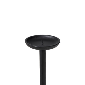 Top view of Agra candle holder showing a round dish with a central spike, crafted from black metal.