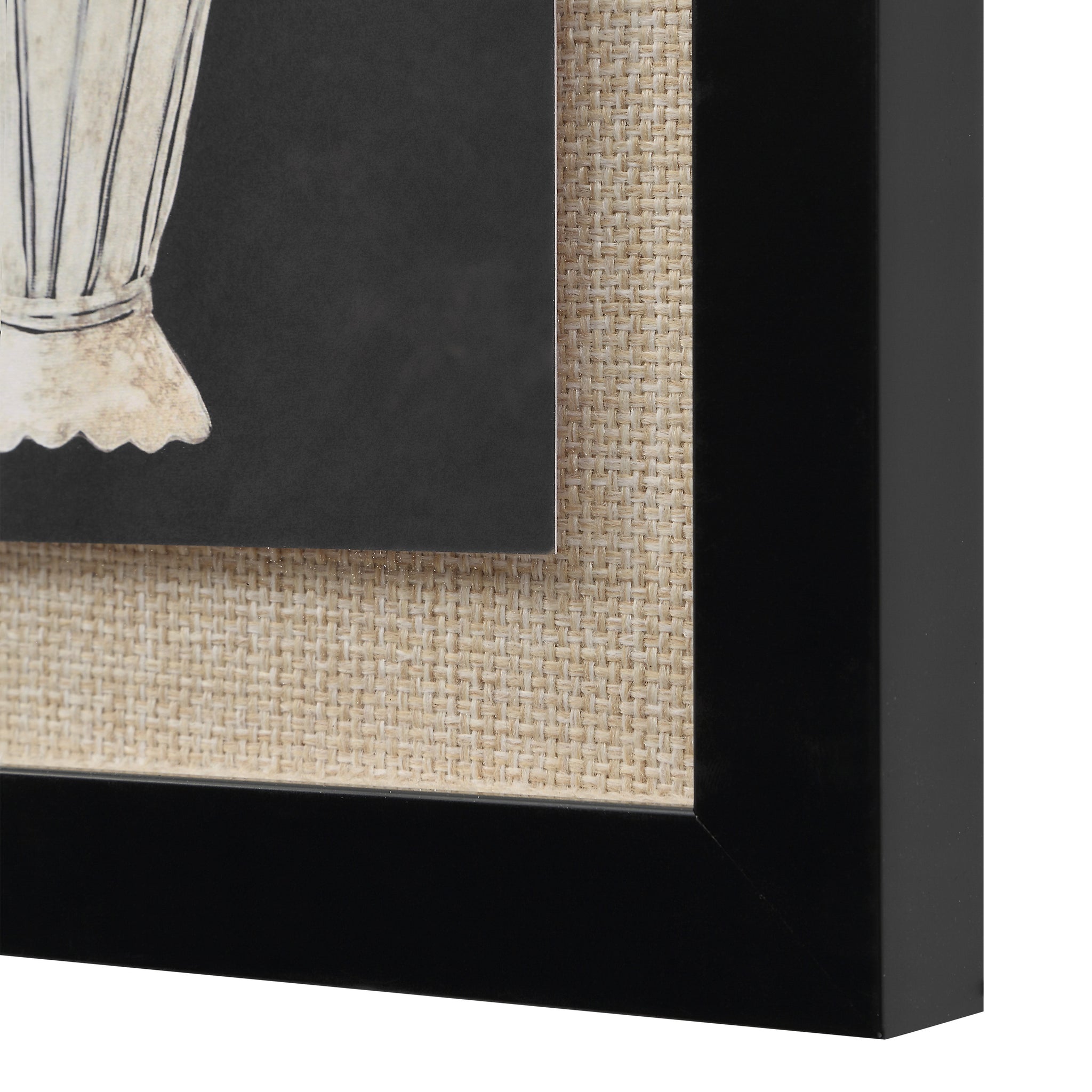 Tecoma canvas art close-up showing a black and white floral vase design with textured frame.