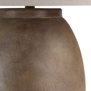 Close-up of Naima Table Lamp showing the textured brown ceramic finish