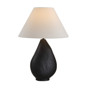 Sotiria table lamp featuring a black textured ceramic base and a white fabric shade, showcasing a modern design.