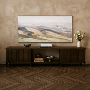 Cresta canvas art displayed above a wooden console table in a stylish interior setting.