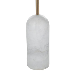 Close-up of Lozica Floor Lamp's marble base with a smooth finish and gold metal stem.