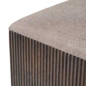 Tristan stool with a herringbone patterned fabric top and dark wood base.