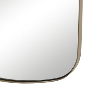 Close-up of Jacossa mirror showcasing the smooth surface and rounded edges