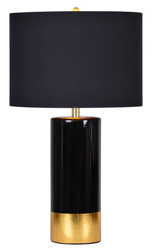 The Tuxedo Table Lamp featuring a black ceramic base with a gold accent and a black fabric shade.
