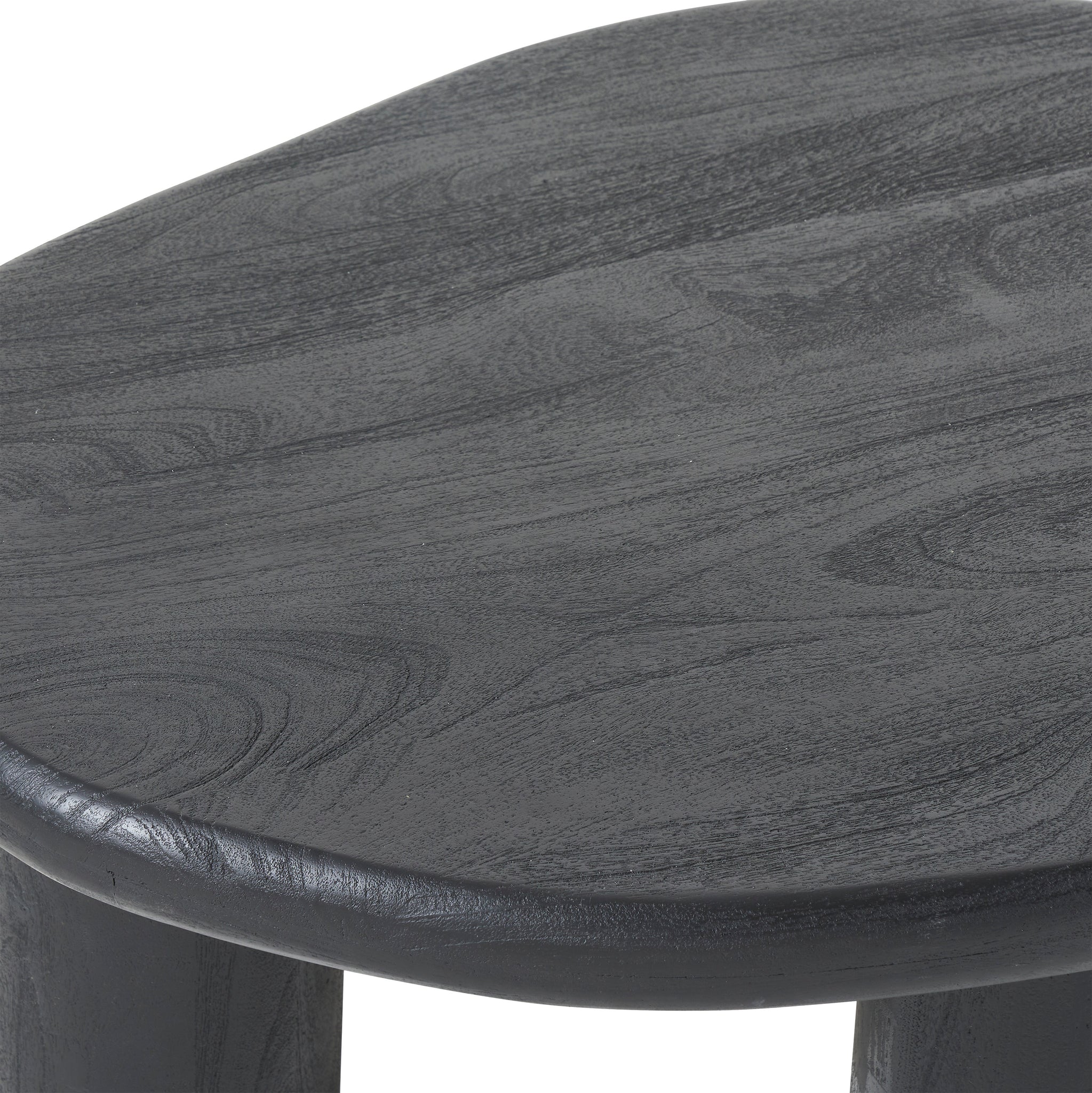 Close-up of Rowe table's textured black surface and rounded edges