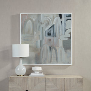 Palazzo canvas art hung on a wall above a wooden console with a lamp and decor.